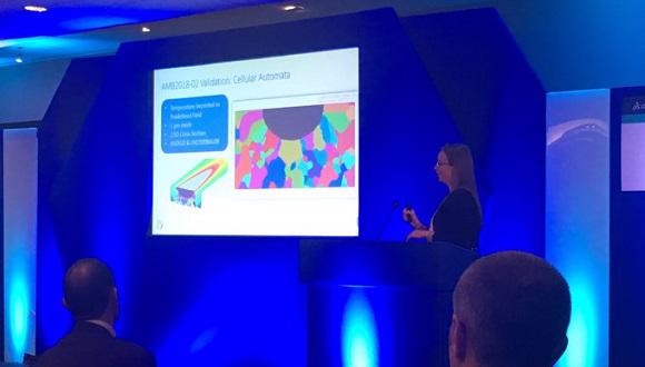 Madie Allen presenting at the event