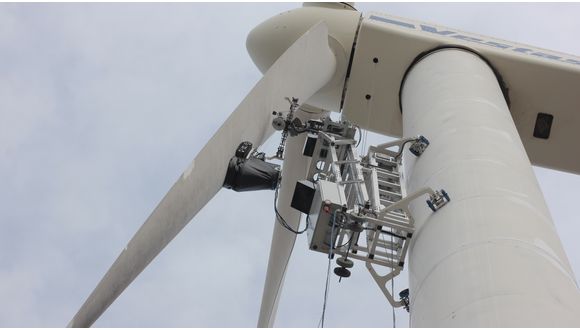 Figure 1. SheaRIOS robotic crawler deployed on a WTB at the Centre for Renewable Energy Sources (CRES)