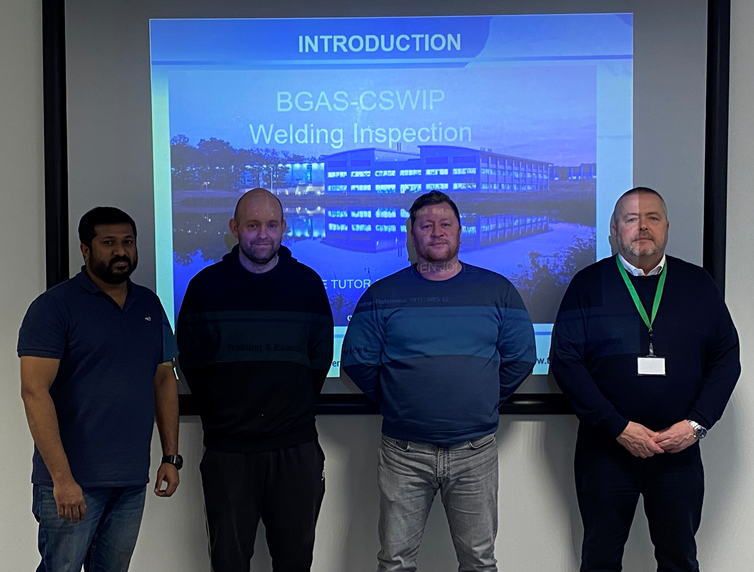 TWI lecturer, Stephen Jones (far right) with the three training candidates.