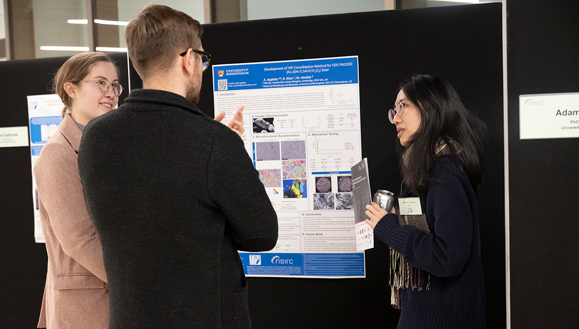 NSIRC PhD student Man Chi Cheung (right) discusses her research with TWI staff and fellow NSIRC students. Photo: TWI / Simon Condie Photographer